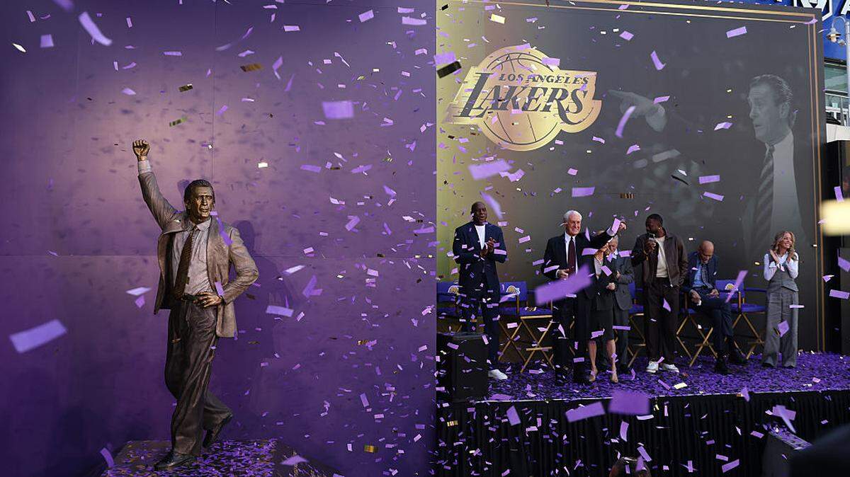 Former head coach Pat Riley watches as the Los Angeles Lakers unveil his statue as they are joined by his wife Chris Rodstrom, Jeanie Buss, Kareem Abdul-Jabbar, Earvin "Magic" Johnson, Dwayne Wade, and Michael Douglas at Crypto.com Arena on February 22, 2026 in Los Angeles.