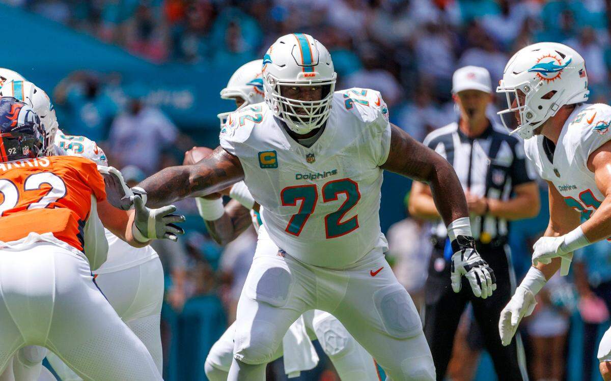 Miami Dolphins offensive tackle Terron Armstead (72) blocks Denver Broncos defensive tackle Jonathan Harris (92) during first quarter of an NFL football game at Hard Rock Stadium on Sunday, Sept. 24, 2023 in Miami Gardens, Fl.
