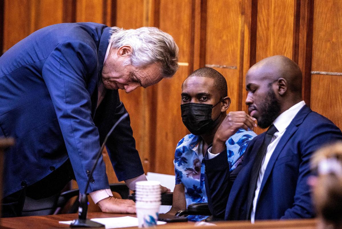 Maiky Simeon appeared in court in a wheelchair in Miami on Tuesday, Sept. 6, 2022. Defense attorney Albert Z. Levin, left, and a cousin of Simeon reacted after he was ordered by Judge Diana Vizcaino to be held without bond in the deaths of five young people in a wrong-way crash on the Palmetto Expressway. Prosecutors now plan to file DUI manslaughter charges.