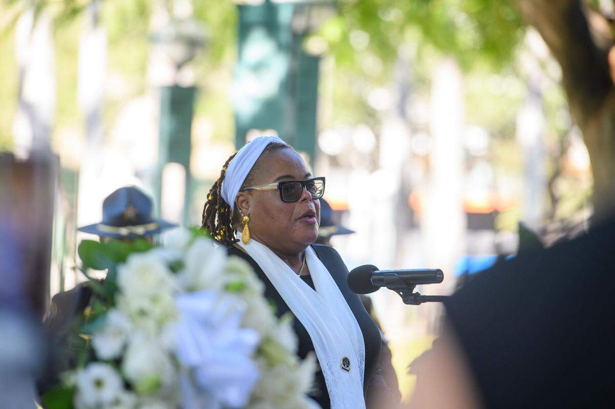 Pauline Clark-Trotman speaks at the Homeless Persons’ Memorial Day Vigil on Friday, Dec. 20, 2024, in Miami.