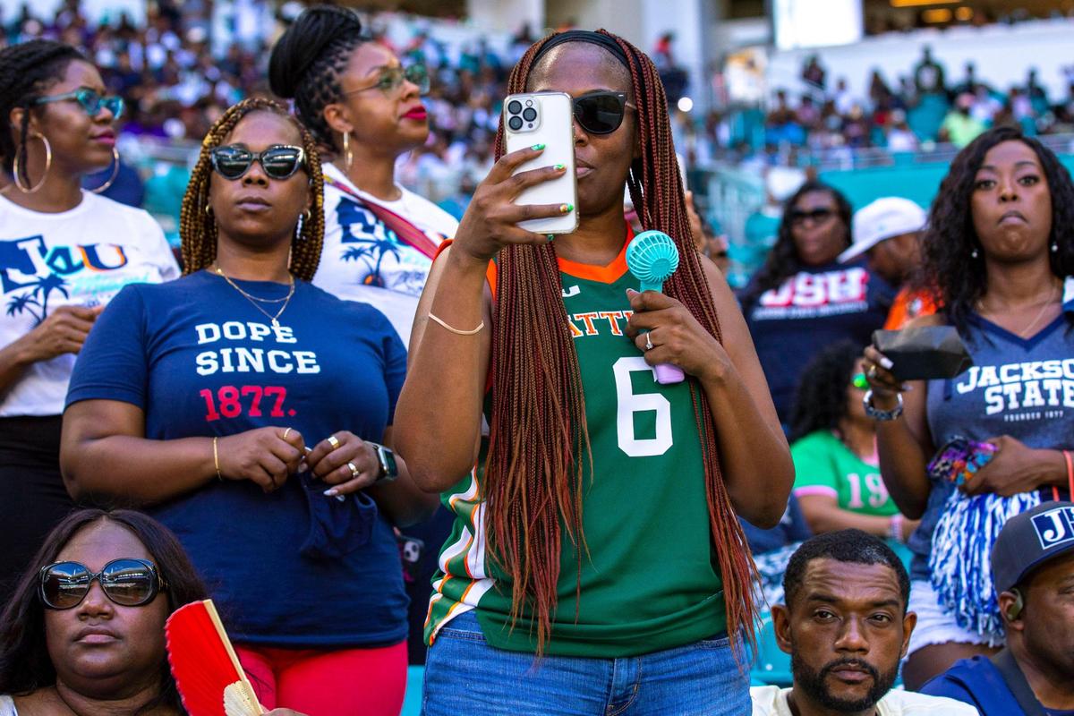 A Florida A&M University fan wears a FAMU LeBron James basketball jersey during the Orange Blossom Classic against Jackson State University at Hard Rock Stadium in Miami Gardens, Florida, Sunday, September 4, 2022. In March 2021, Nike and FAMU agreed to a partnership that outfitted all 14 sports programs and the Marching 100 band with James’ logo.