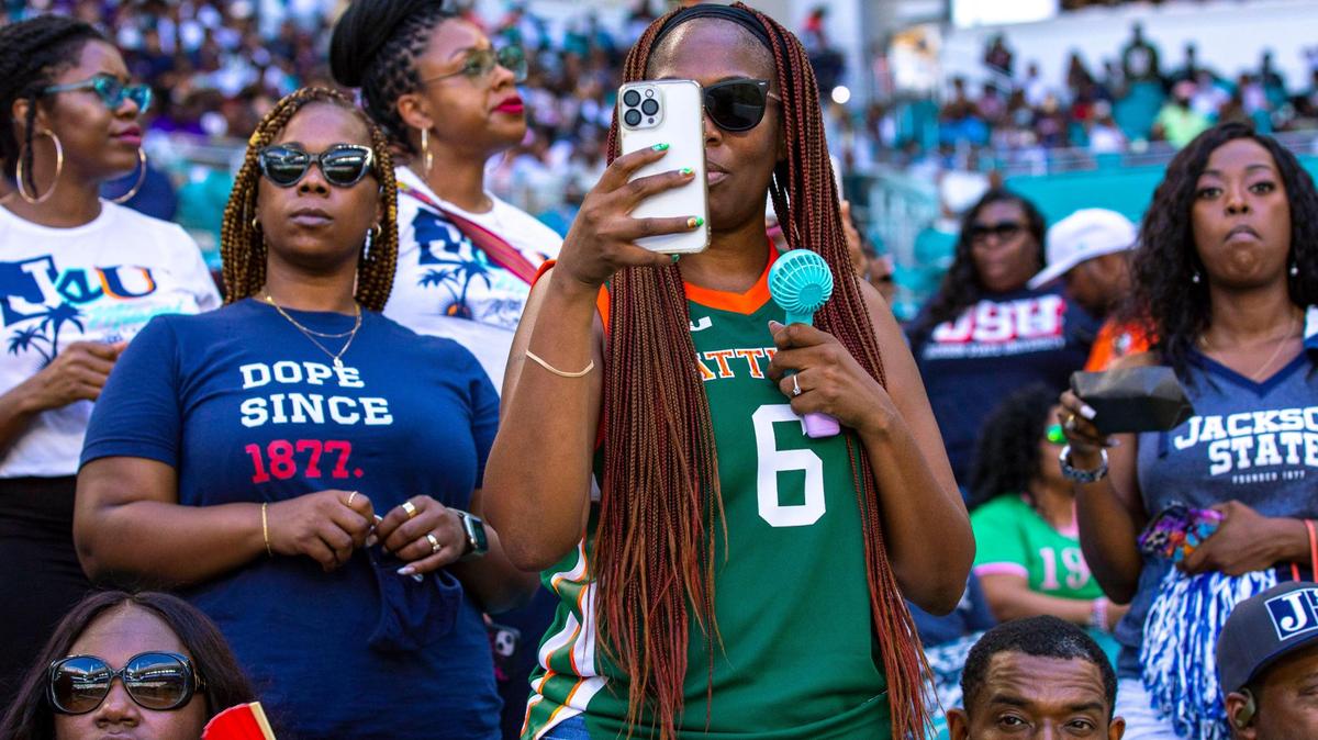 A Florida A&M University fan wears a FAMU LeBron James basketball jersey during the Orange Blossom Classic against Jackson State University at Hard Rock Stadium in Miami Gardens, Florida, Sunday, September 4, 2022. In March 2021, Nike and FAMU agreed to a partnership that outfitted all 14 sports programs and the Marching 100 band with James’ logo.