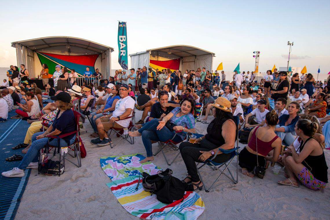 People watch live musical performances during Miami Beach Live International Music Weekend in Miami Beach, Florida, on Saturday, March 19, 2022.