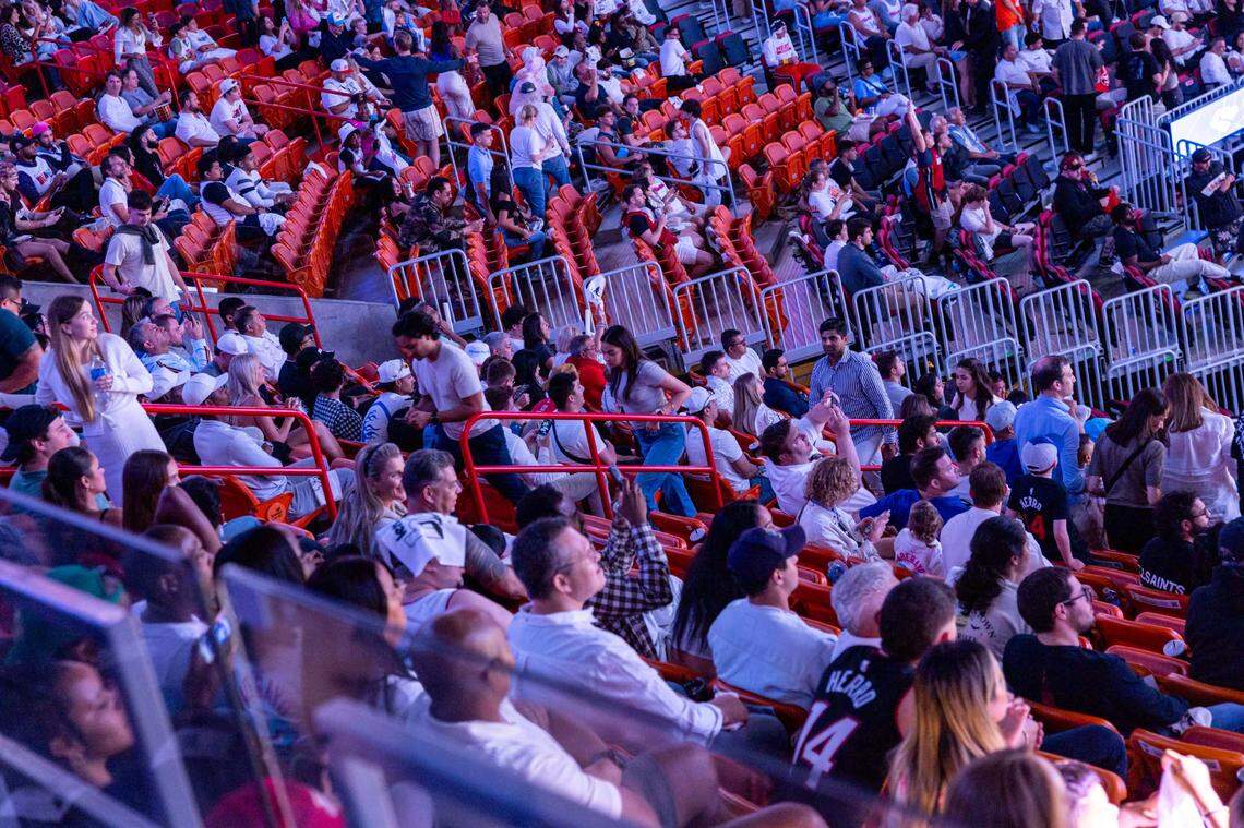 Miami Heat fans leave the arena early during the second half of Game 4 of the Eastern Conference NBA Playoffs against the Cleveland Cavaliers at Kaseya Center on April 28, 2025, in Miami.