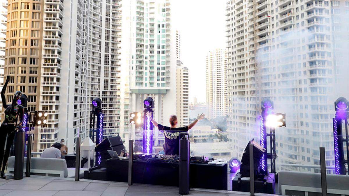 DJ David Guetta performed a two-hour set in downtown Miami on April 18 to raise money for food charity groups.