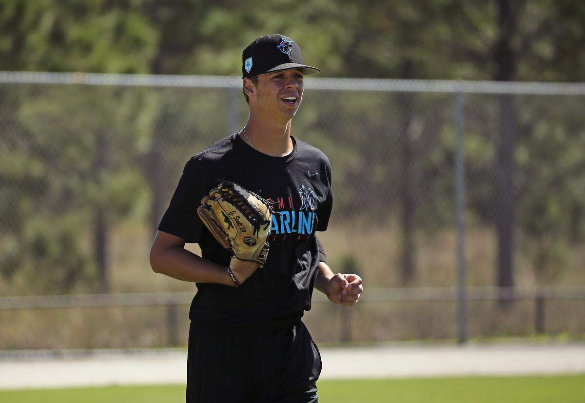 Miami Marlins minor league outfielder Connor Scott runs drills during practice spring training game at the Roger Dean Chevrolet Stadium on Wednesday, March 6, 2019 in Jupiter, FL.