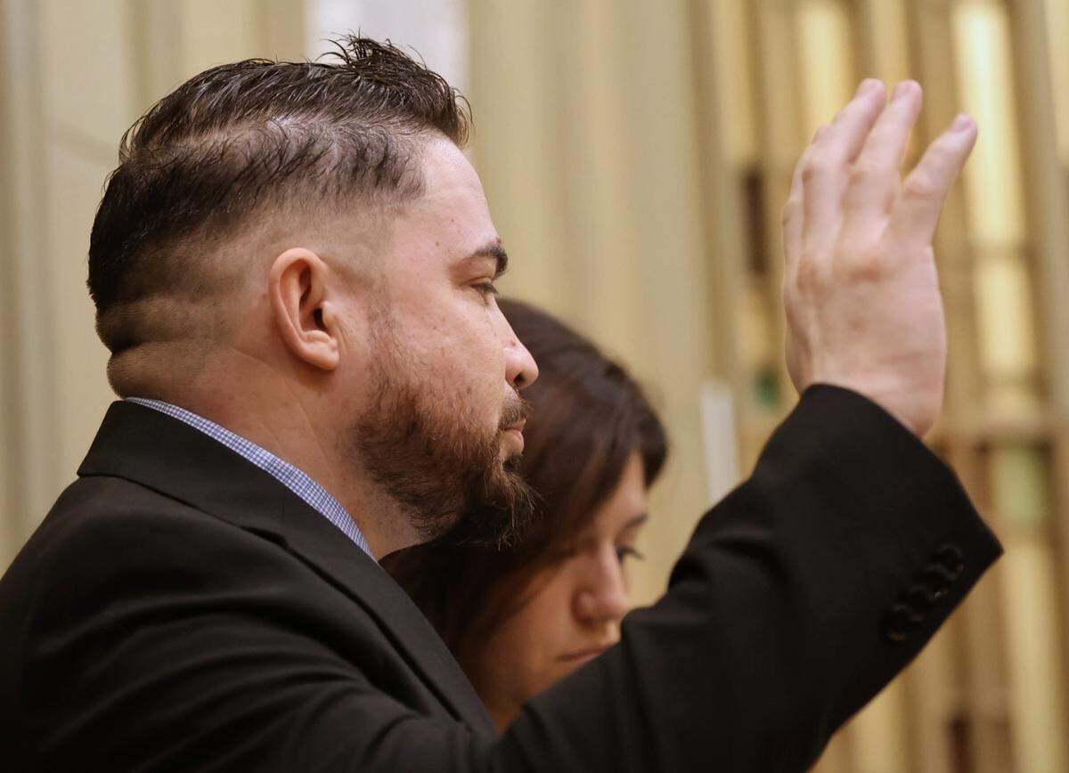 Daniel Ramos-Aviles, left, Miami-Dade cop who is accused of sexually abusing children appears with his attorneys Scott Kotler and Natalie Lopez, right, during the closing arguments of his trial presided over by Judge Marisa Tinkler Mendez in the Courtroom 4-6 at the Richard E. Gerstein Justice Building on Wednesday, September 3, 2025, in Miami, Florida.