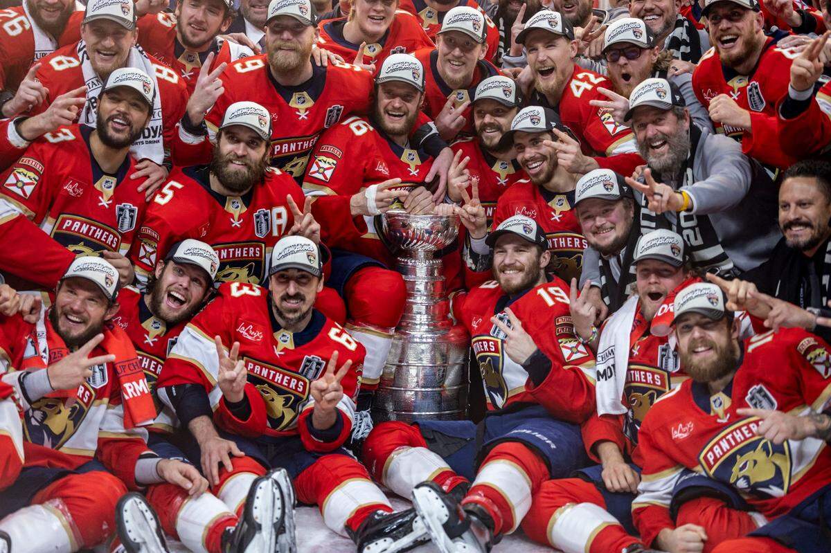 Florida Panthers pose with the Stanley Cup after the Panthers defeated the Edmonton Oilers in Game 6