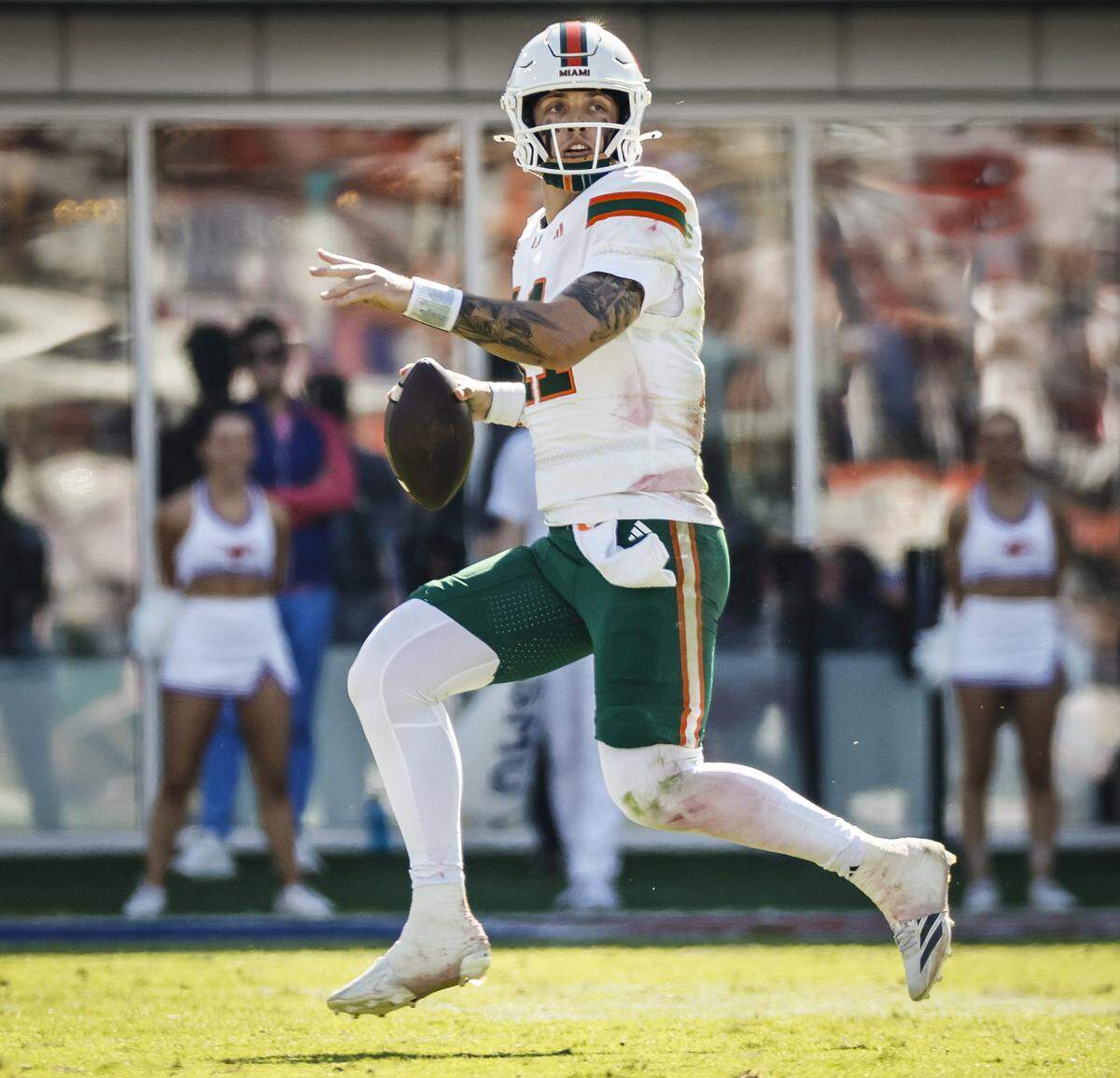 Miami Hurricanes quarterback Carson Beck (11) looks to pass during the second half of an NCAA football game against the Southern Methodist University Mustangs at Gerald Ford Stadium on Saturday, November 1, 2025, in Dallas, Texas.