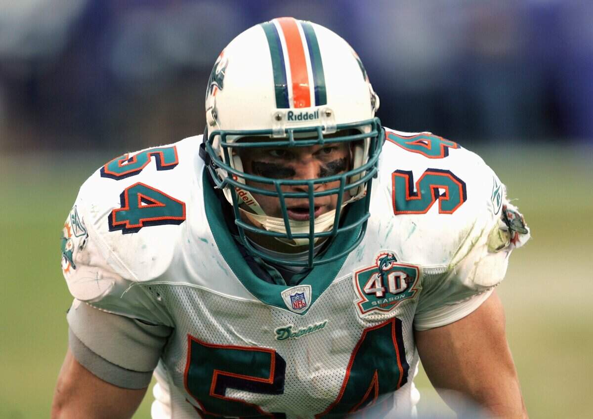Zach Thomas #54 of the Miami Dolphins lines up during the NFL game with the San Diego Chargers on December 11, 2005 at Qualcomm Stadium in San Diego, California. The Dolphins won 23-21.