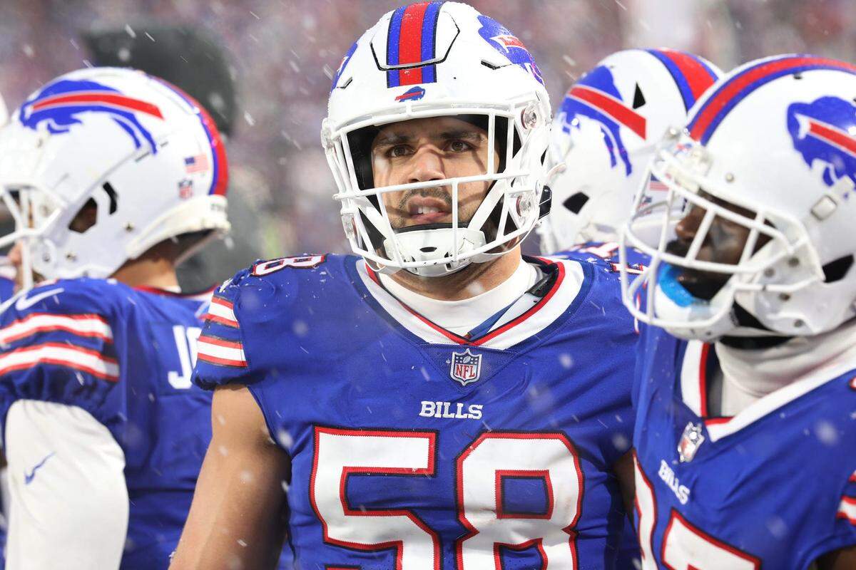 Buffalo Bills Matt Milano makes a face as he watches the action on the large screen hanging over the field. The Bills hosted the Cincinnati Bengals in their division playoff game and lost, Jan. 22, 2023. Bills Matt Milano