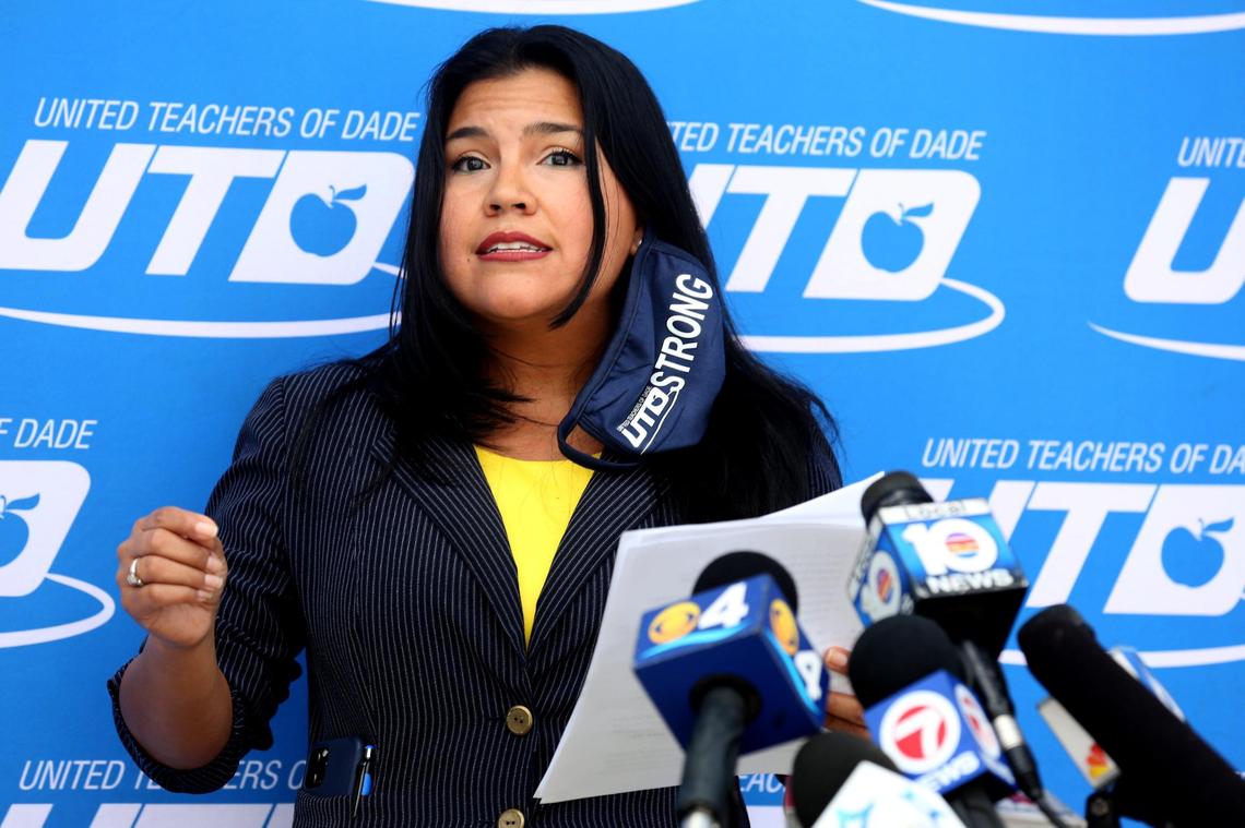 United Teachers of Dade President Karla Hernandez-Mats, joined by members of the Broward Teachers Union, speaks during a press conference about the health and safety gaps that need to be addressed before the reopening of schools in both counties. They gathered at the UTD headquarters in Miami Springs on Wednesday, Sept. 16, 2020.