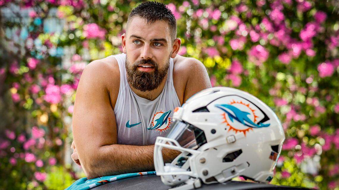 Miami Dolphins defensive tackle Zach Sieler (92) waits his turn to be interviewed by reporters after practice at Miami Dolphins Training Camp in Miami Gardens, Florida, on Thursday, July 24, 2025.