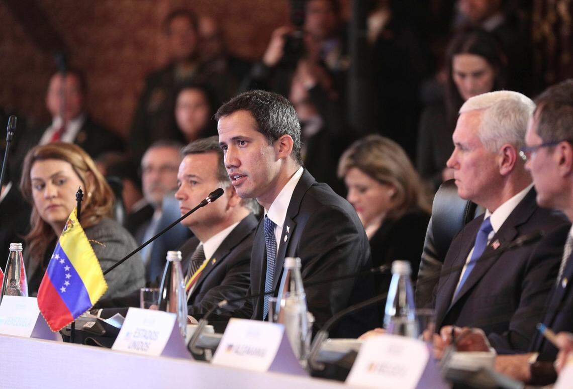 Venezuela’s self-proclaimed interim president Juan Guaido speaks at an emergency meeting of the Lima Group concerning Venezuela, at the Foreign Ministry in Bogota, Colombia, Monday, Feb. 25, 2019. Vice President Mike Pence is at right.