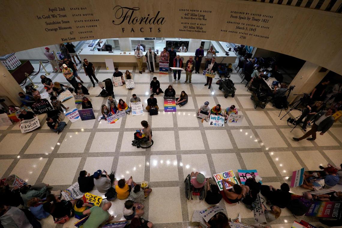 Demonstrators protest inside the Florida State Capitol, Monday, March 7, 2022, in Tallahassee. Florida House Republicans advanced a bill, dubbed by opponents as the “Don’t Say Gay” bill, to forbid discussions of sexual orientation and gender identity in schools, rejecting criticism from Democrats who said the proposal demonizes LGBTQ people. The Florida Senate is expected to vote on the bill Tuesday.