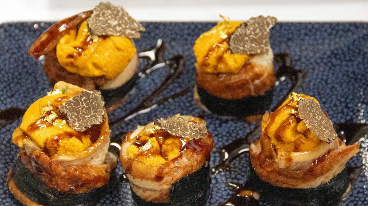 ​INTI.MO​ with unagi, uni, ikura, truffle and gold flakes.