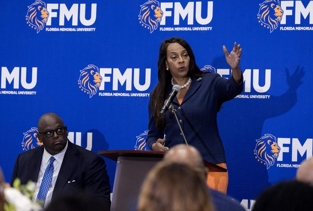 William C. McCormick, Jr. (left) President of the Florida Memorial University listens as Florida Senator Rosalind Osgood, speaks during an event  ahead of signing a historic lease agreement between Mr. McCormick and St. Johns County officials that paves the way for Florida's first Black History Museum - to be built on the sacred ground where the university was founded.”  at Florida Memorial University in Miami Gardens, on Friday October 17, 2025.