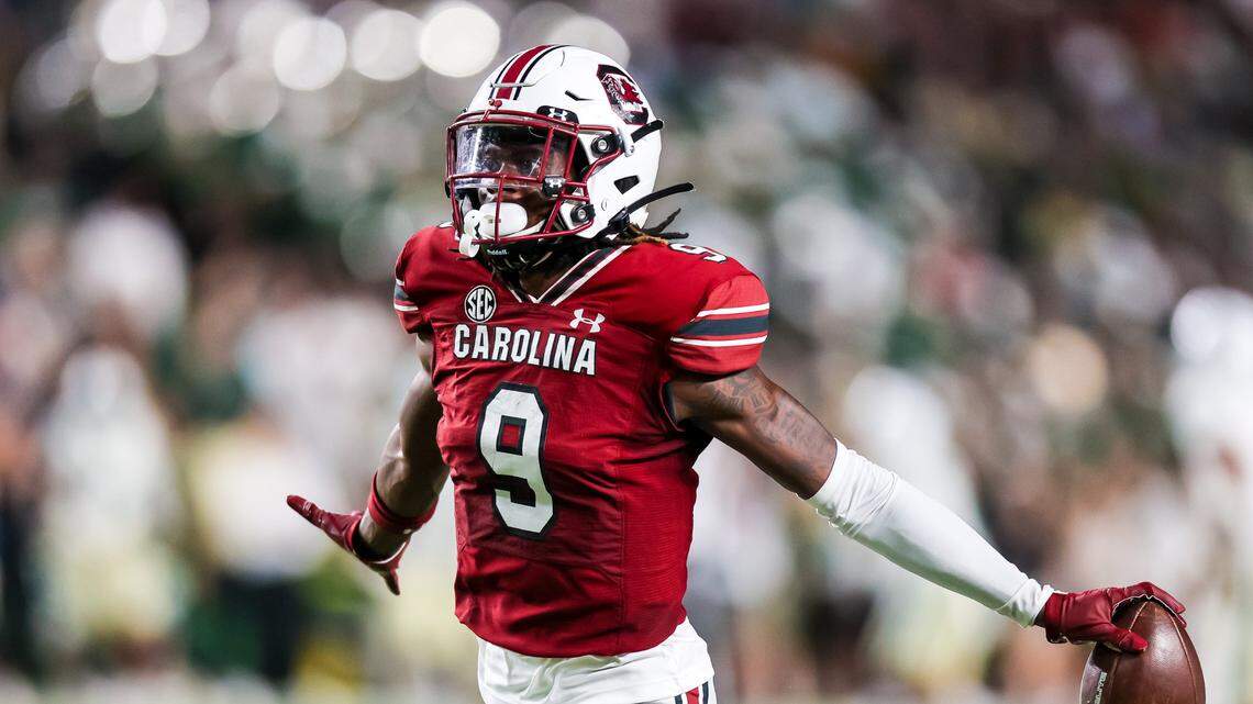 Sep 24, 2022; Columbia, South Carolina, USA; South Carolina Gamecocks defensive back Cam Smith (9) celebrates an interception against the Charlotte 49ers in the second half at Williams-Brice Stadium. Mandatory Credit: Jeff Blake-USA TODAY Sports