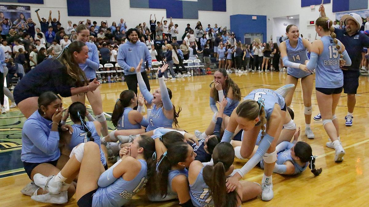 Our Lady of Lourdes Academy Bobcats celebrate victory against Archbishop McCarthy Mavericks during 2024 FHSAA Girls Volleyball State Championship on Wednesday, October 30, 2024 at Our Lady of Lourdes Academy in Miami. Andrew Uloza / for Miami Herald