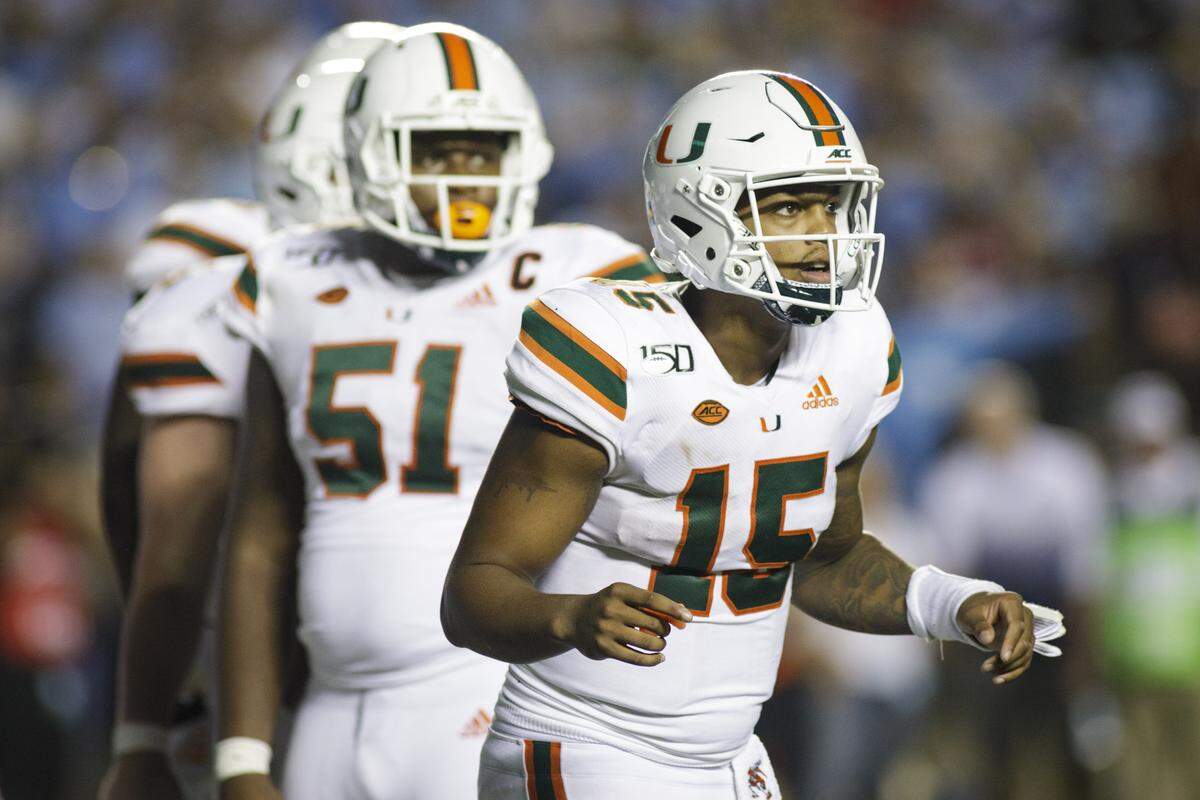 Miami quarterback Jarren Williams (15) looks towards the sidelines for the play call as the Hurricanes play against the University of North Carolina - Chapel Hill at Kenan Stadium in Chapel Hill, NC on Saturday, September 7, 2019.