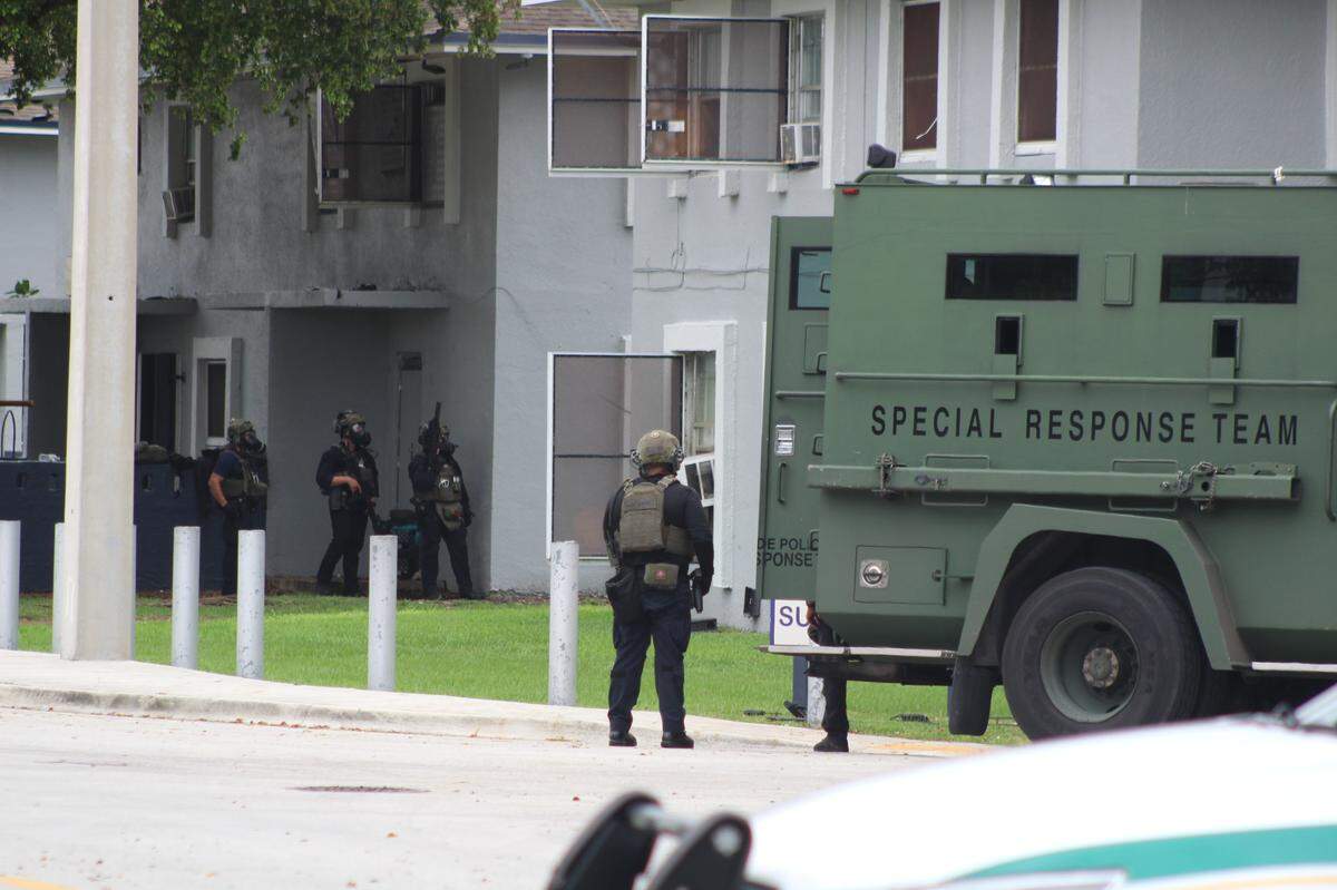 Officers respond to a home in the area of Southwest 138th Road and 260th Street near Naranja after reports of a person barricaded themselves inside an apartment complex on Thursday, June 13, 2024.