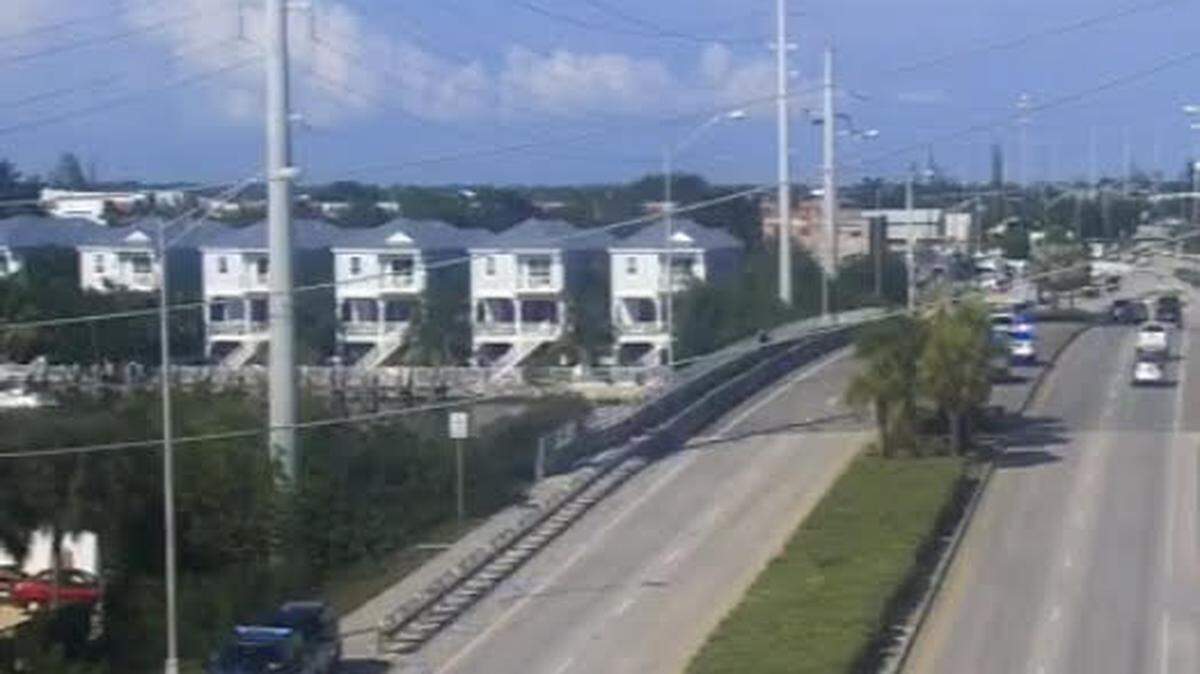 A Florida Department of Transportation camera shows emergency vehicles parked on the Vaca Cut Bridge in the Middle Florida Keys city of Marathon Wednesday, May 24, 2023, after a barge had hit the span.