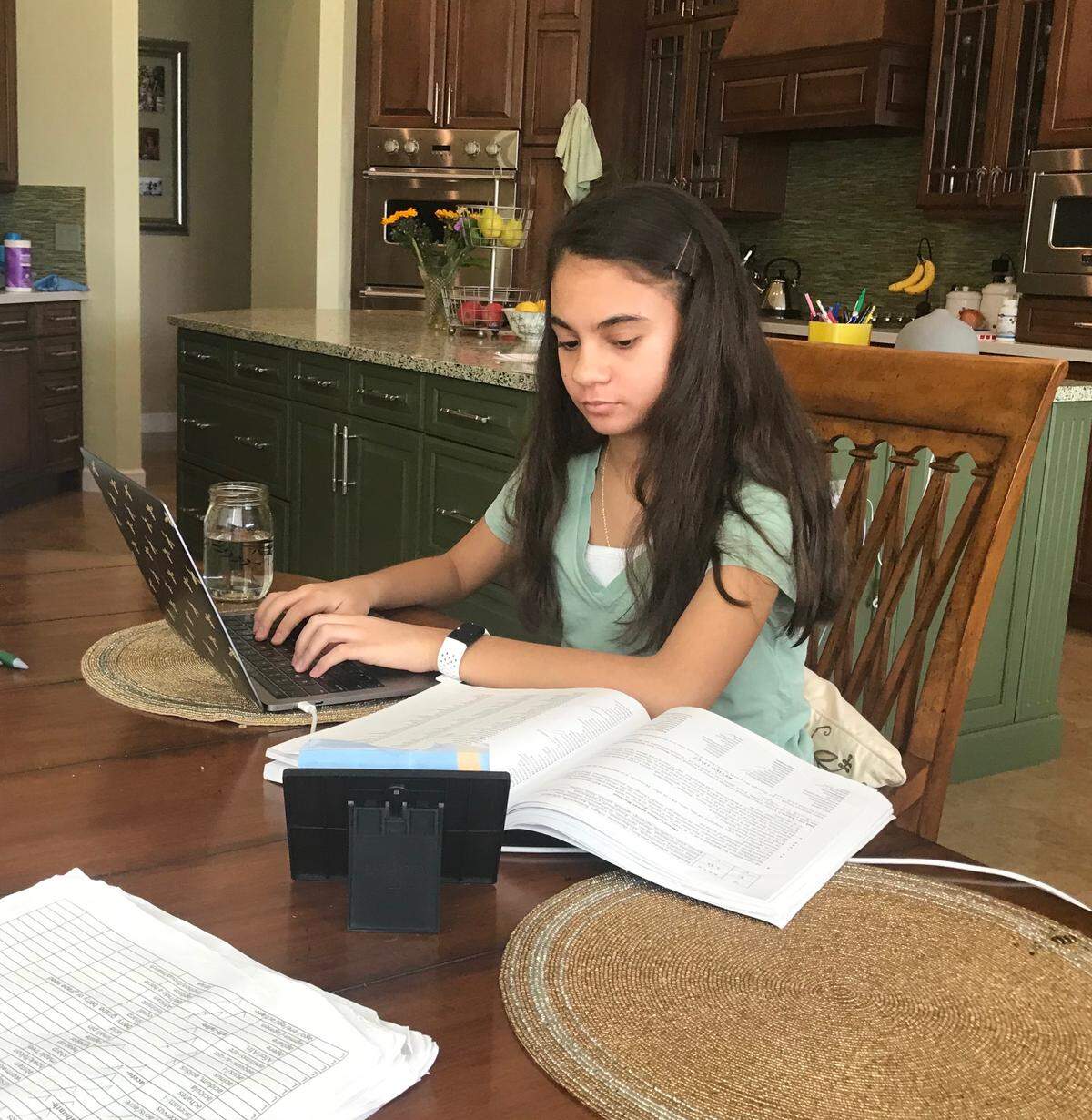 Simone Kaplan, 14, studies in her Davie home for Scripps National Spelling Bee, which has been suspended because of coronavirus concerns.