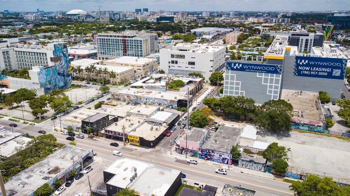 A view looking west over Miami’s Wynwood neighborhood, where old warehouses mix with new mid-rise buildings under a 10--year-old special zoning plan.