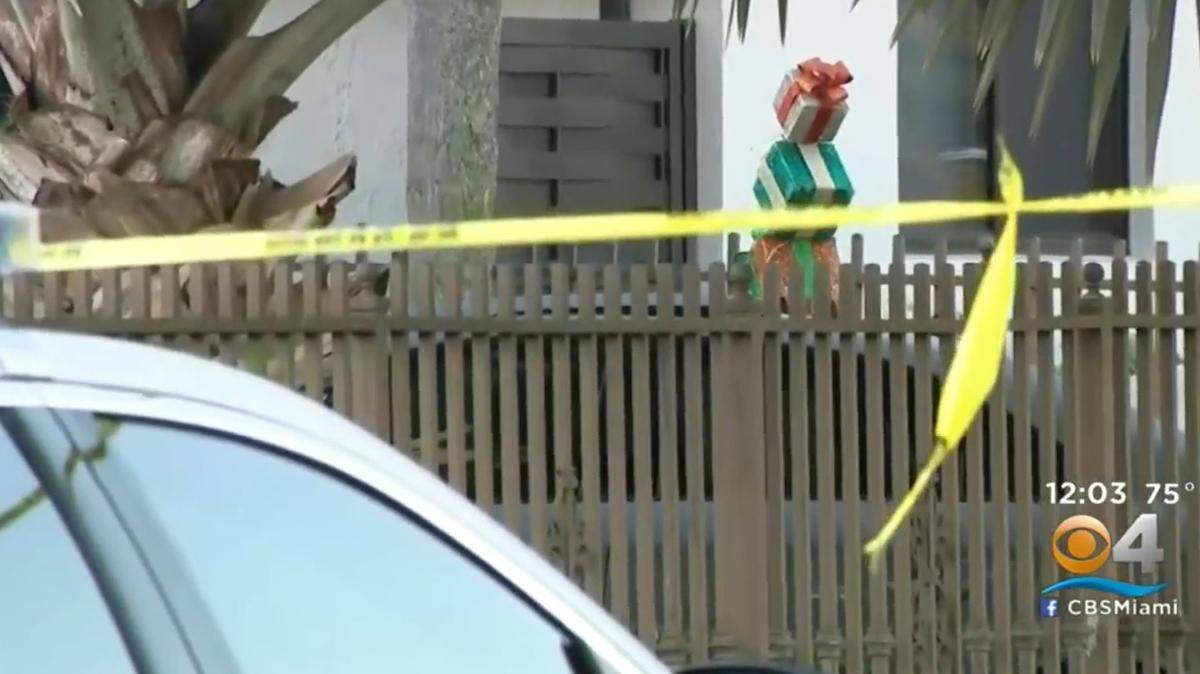 When police arrived at a house in the 13300 block of Southwest 20th Street, they found a 37-year-old woman shot dead in the backyard. Police also found a man with a gunshot wound. Miami-Dade police believe a husband fatally shot his wife and then turned the gun on himself as an attempted suicide. Screen grab from CBS4 broadcast.