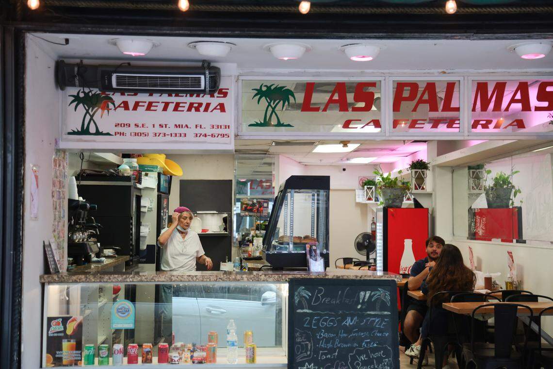 Las Palmas Restaurant owner Carla Luigia Ferrari Magalhaes works behind the bar at 209 SE First St., in downtown Miami, Florida, on Thursday, Nov. 6, 2025.