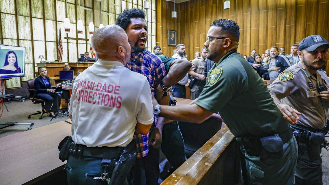Adrian Cosby has to be restrained in a Miami-Dade courtroom late Friday, Oct. 25, 2024, after he was found guilty of murdering Andrea Camps-Lacayo, an 18-year-old student at Terra Environmental Research Institute in West Kendall. She was killed in 2020 in a botched robbery of expensive sneakers. Cosby leapt at Andrea’s father while he was reading a statement in court.