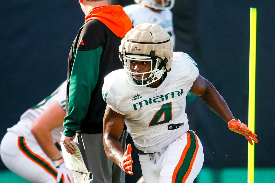 Miami Hurricanes linebacker Keontra Smith (4) works out during football practice at the University of Miami campus in Coral Gables, Florida, Thursday, March 23, 2023.