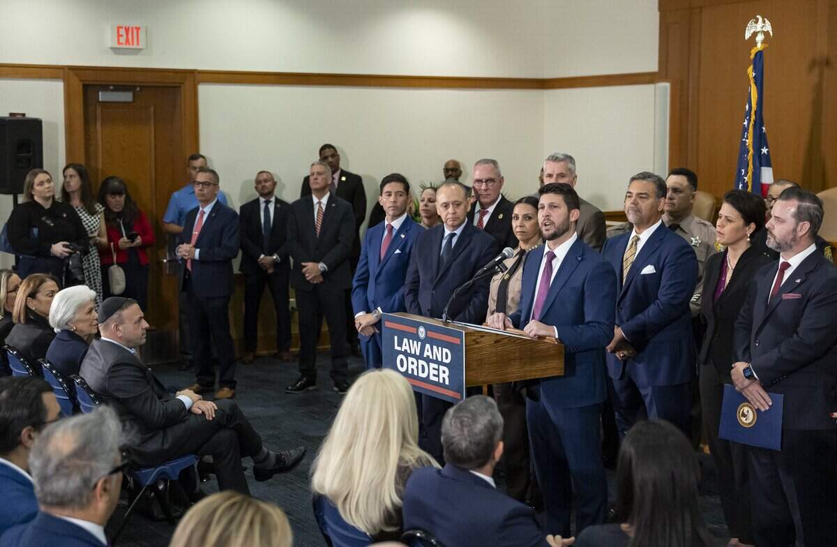 Florida Attorney General James Uthmeier speaks during a press conference at Florida International University on Monday, Oct. 19, 2026, in Miami, Fla. Uthmeier announced that Florida is filing charges against former Cuban leader Raul Castro.