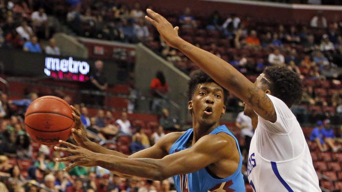 Florida State Seminoles guard Terance Mann (14) passes the ball as Saint Louis Billikens guard Jordan Goodwin (0) defends in the first half during game between Florida State University and Saint Louis University at the Orange Bowl Basketball Classic in the BB&T Center in Sunrise on Saturday, December 22, 2018.