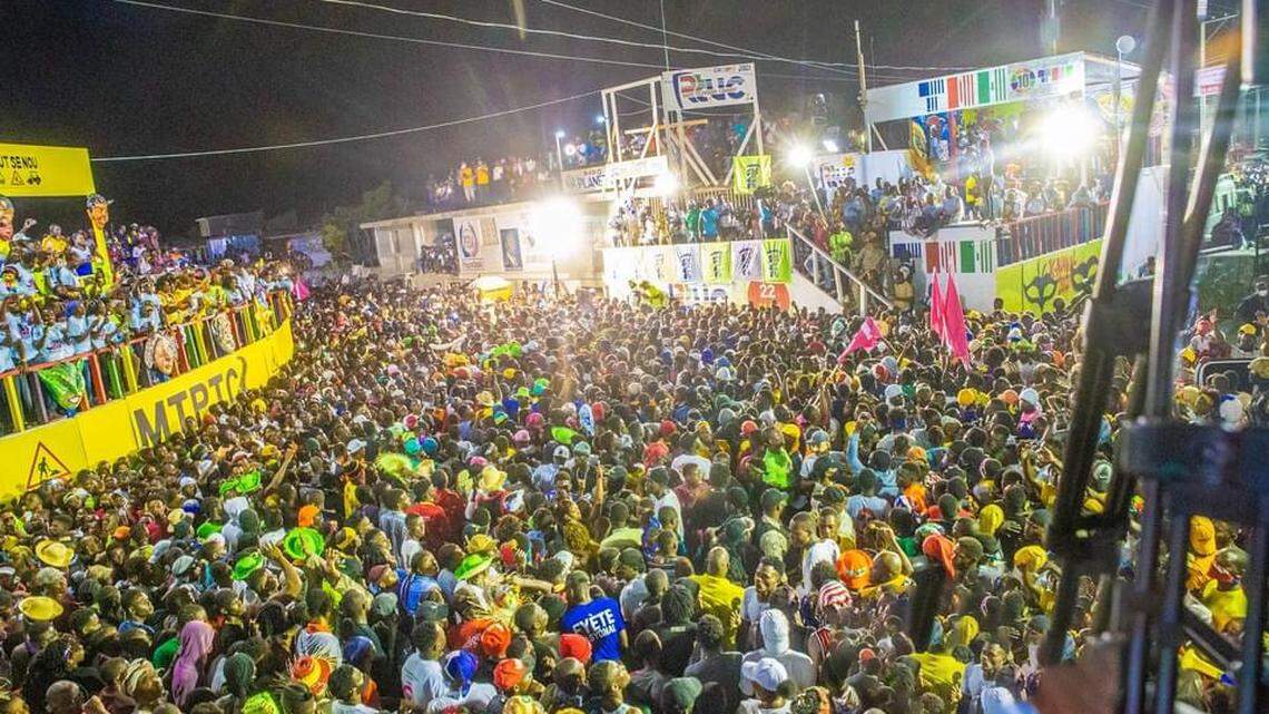 Haitians party in Port-de-Paix, Haiti during the country’s three day National Carnival, which began on Sunday, February 14, 2021. The potential COVID-19 super spreader has led to the Bahamas issuing a temporary ban.