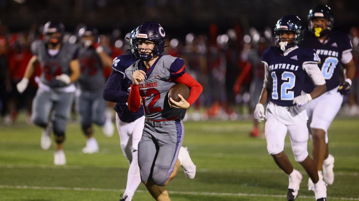 Columbus Explorers quarterback Jason Barket (12) runs with the football for a touchdown against the Palmetto Panthers during the third quarter of a high school football game at Tropical Park Stadium in Miami, Florida, on Friday, September 13, 2024.
