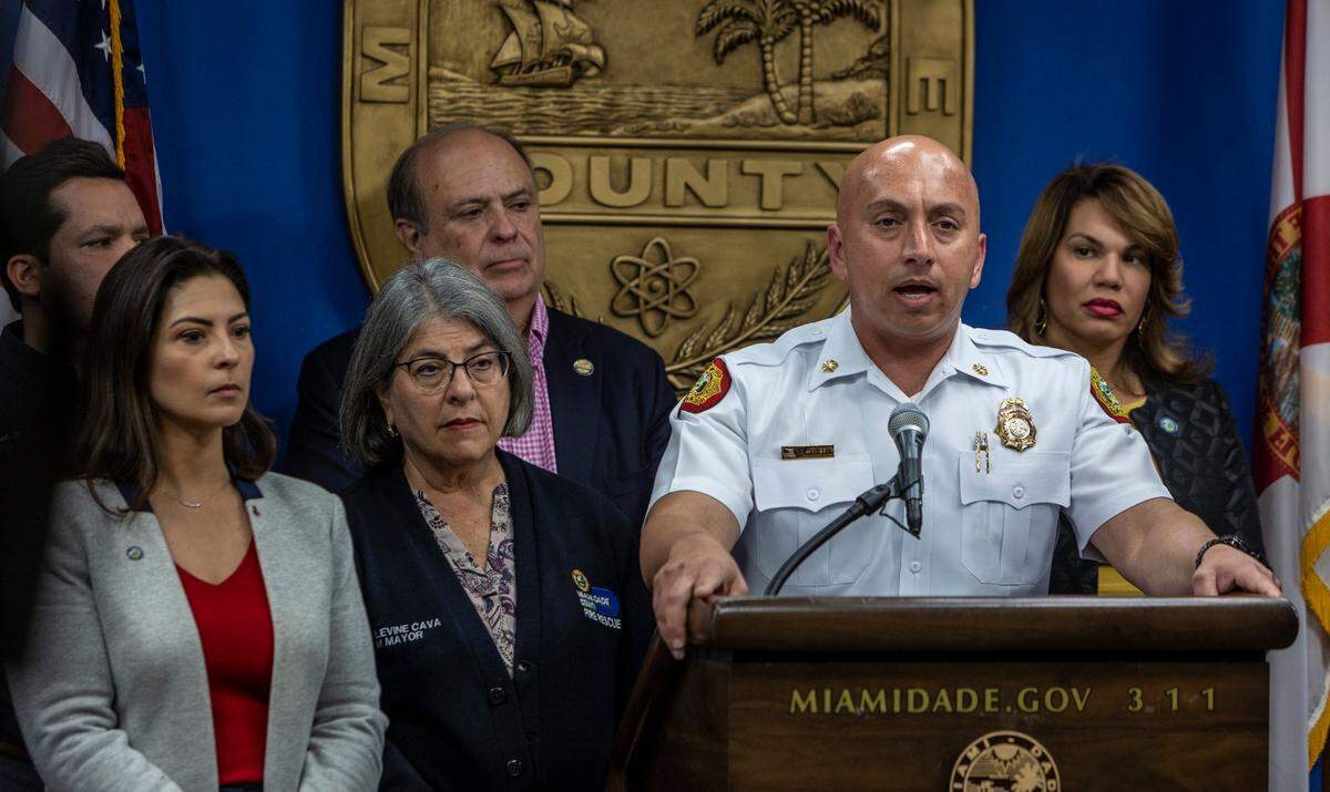 Miami-Dade County Fire Chief Raied “Ray” Jadallah, right, speaks to reporters during a press conference Monday, Feb. 13, 2023, at the Miami-Dade County Emergency Operations Center to update the progress of suppressing the fire at the Covanta Energy incinerator plant located at 6990 NW 97th Avenue, Doral.