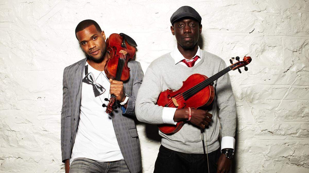 Kev Marcus, left, and Wil Baptiste, known as the Black Violin, will be among the groups that will hold free virtual performances for students and teachers in Miami-Dade Schools through the newly formed Miami-Dade Arts Education Collective.