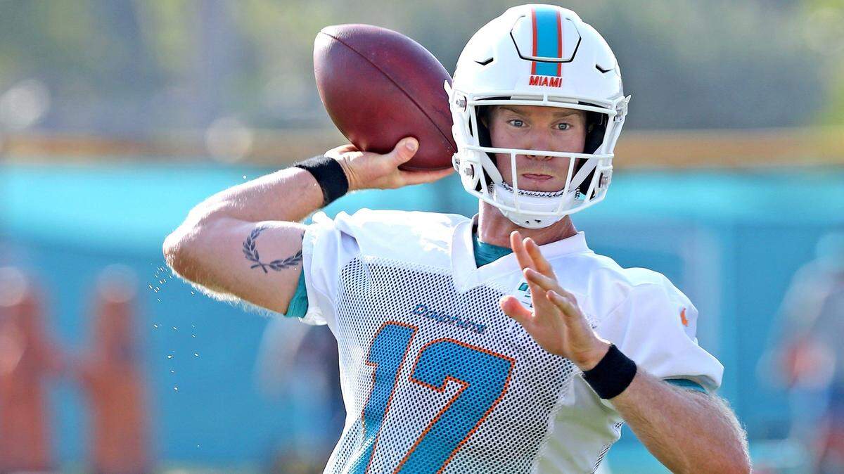Miami Dolphins quarterback Ryan Tannehill was briefly shaken up after taking an unexpected hit during practice Wednesday.