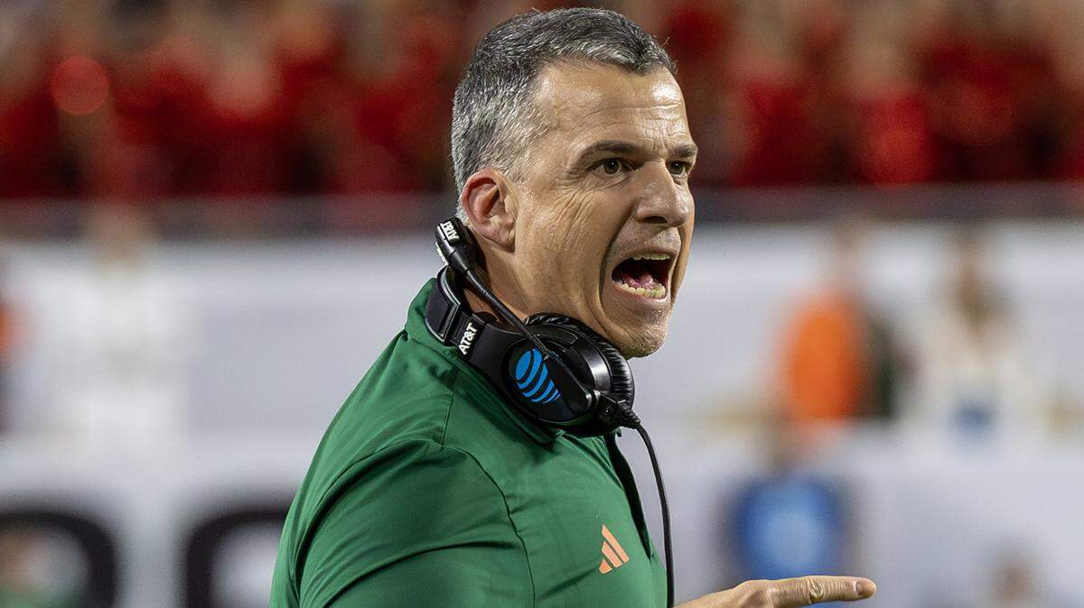 Miami Hurricanes head coach Mario Cristobal reacts during the first half of the College Football Playoff national championship game against the Indiana Hoosiers on Monday, Jan. 19, 2026, at Hard Rock Stadium in Miami Gardens, Fla.