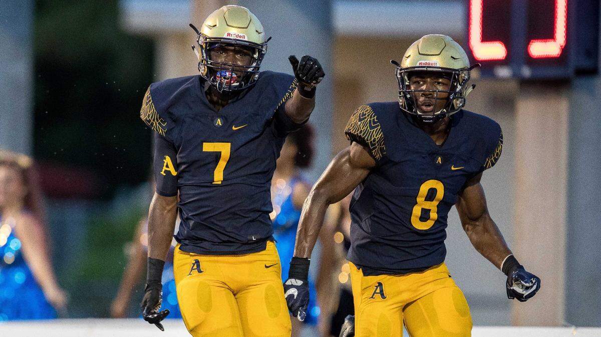 St. Thomas Aquinas’  Jordan Battle (7) and Jahmar Brown (8) are pictured celebrating a win during the nationally televised football matchup between DeMatha and St. Thomas Aquinas on Saturday August 25, 2018.