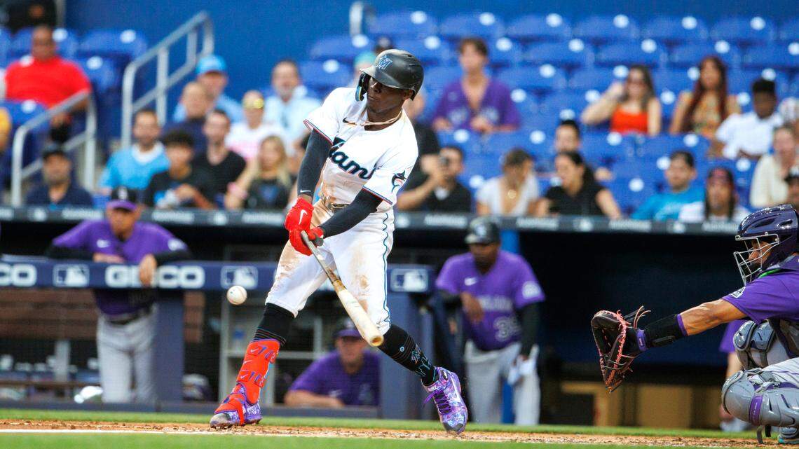 Miami Marlins second baseman Jazz Chisholm Jr. (2) hits a RBI single during the third inning of a baseball game against the Colorado Rockies at LoanDepot Park on Wednesday, June 22, 2022 in Miami, Florida.