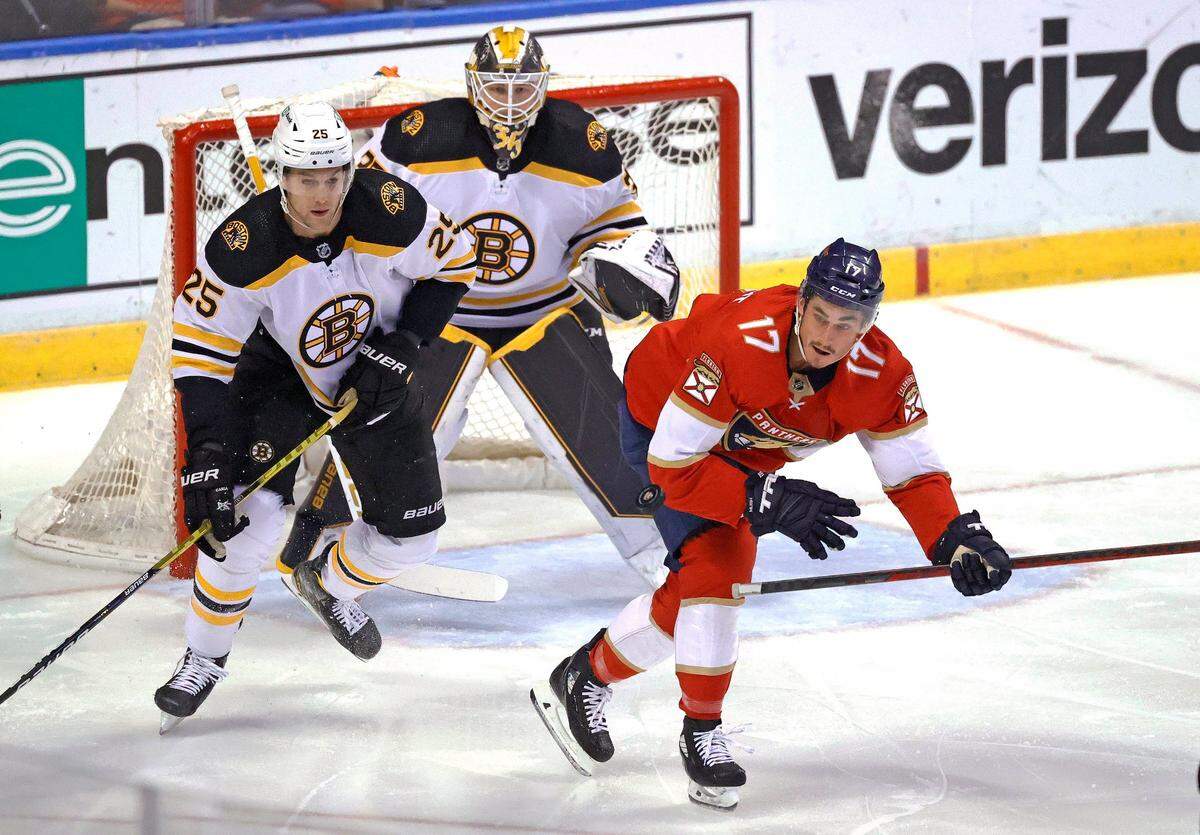 Boston Bruins defenseman Brandon Carlo (25) and goaltender Linus Ullmark (35) defend the goal from Florida Panthers left wing Mason Marchment (17) during the first period of an NHL game at the FLA Live Arena on Wednesday, October 27, 2021 in Sunrise, Fl.
