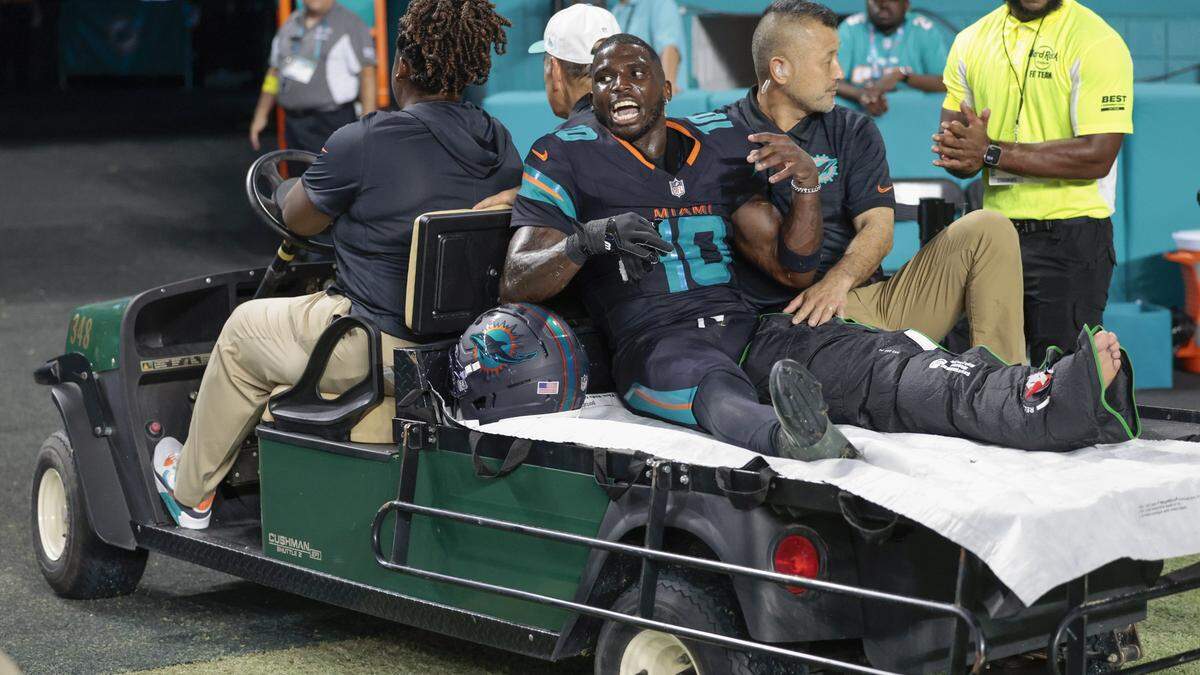 Miami Dolphins wide receiver Tyreek Hill (10) is carted off after an injury in the second half of the NFL game against the New York Jets at Hard Rock Stadium in Miami Gardens, Florida, on Monday, September 29, 2025.