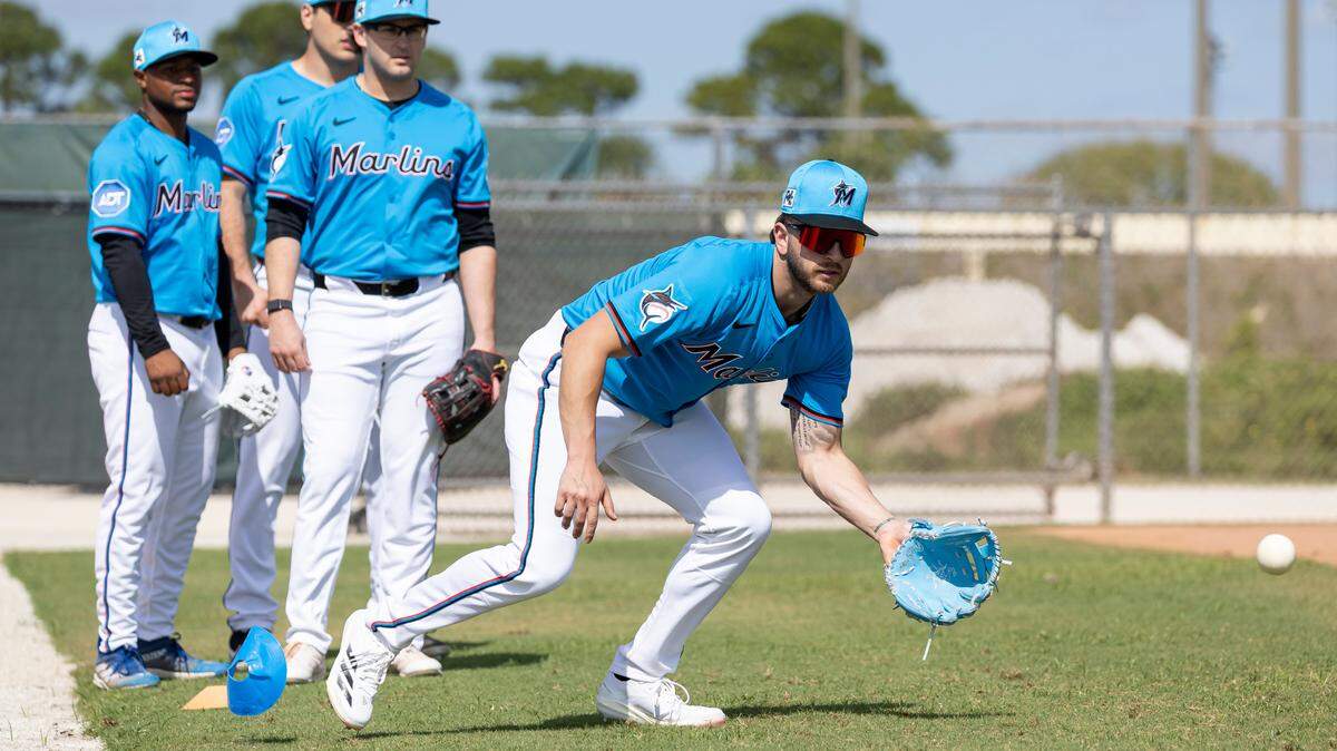 Miami Marlins third base Connor Norby (1) catches the ball during first full-squad spring training workouts at Roger Dean Chevrolet Stadium on Monday, Feb. 17, 2025, in Jupiter, Fla.