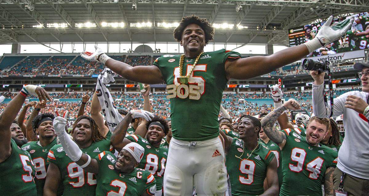 Miami Hurricanes defensive lineman Gregory Rousseau (15) wears the turnover chain for the first time in his career when he recovered a fumble that he caused in the Sept. 21 game against Central Michigan. He’s a potential option for the Miami Dolphins in the 2021 NFL Draft.