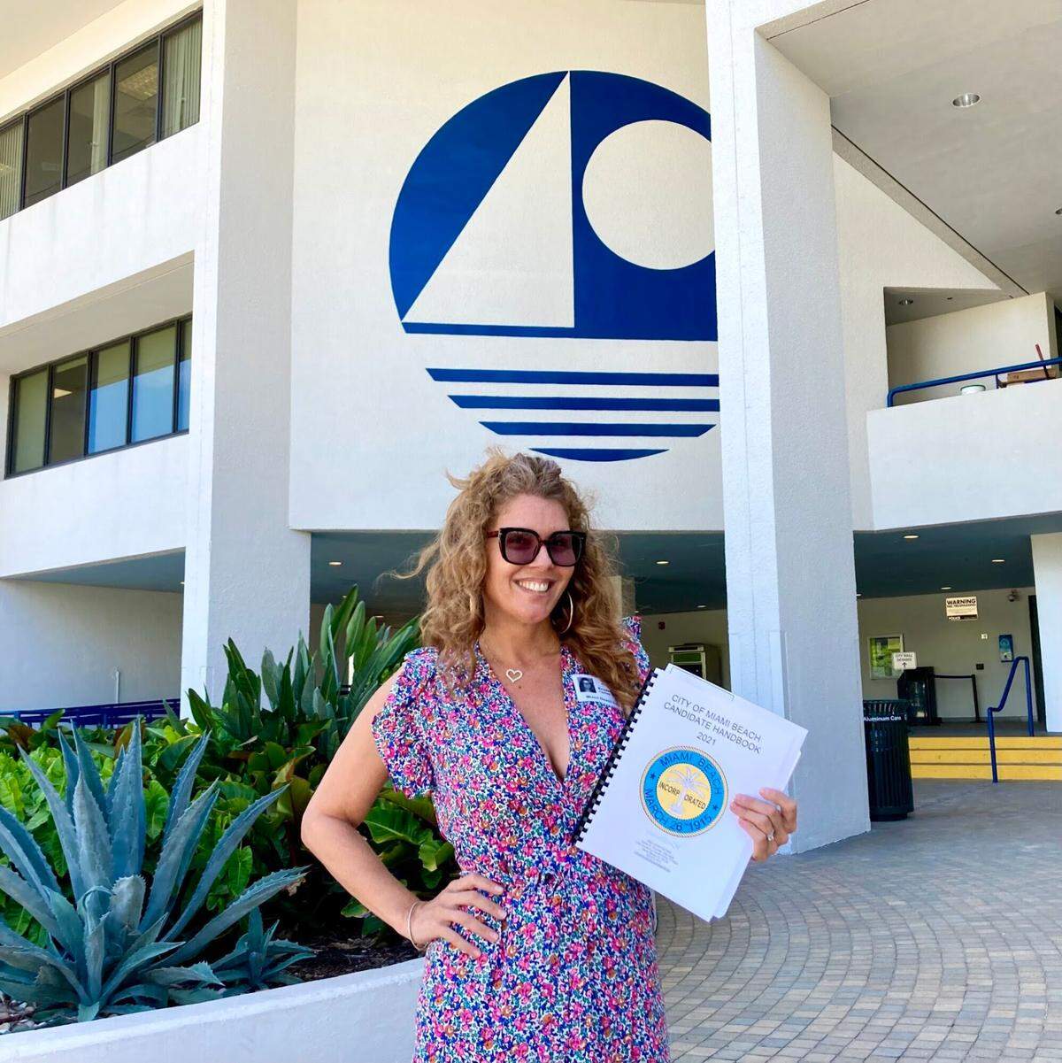 Miami Beach Commission candidate Kristen Rosen Gonzalez stands in front of City Hall after filing to run in the November election. Rosen Gonzalez previously served as a city commissioner.