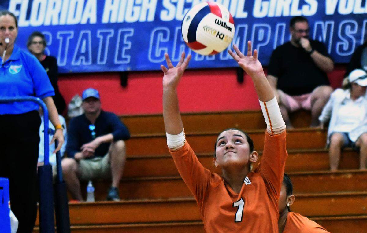 Mater Lakes junior Antonella Maldonado sets up a shot against Orlando Bishop Moore during the Class 4A girls volleyball state championship game on Saturday at Polk State College in Winter Haven.