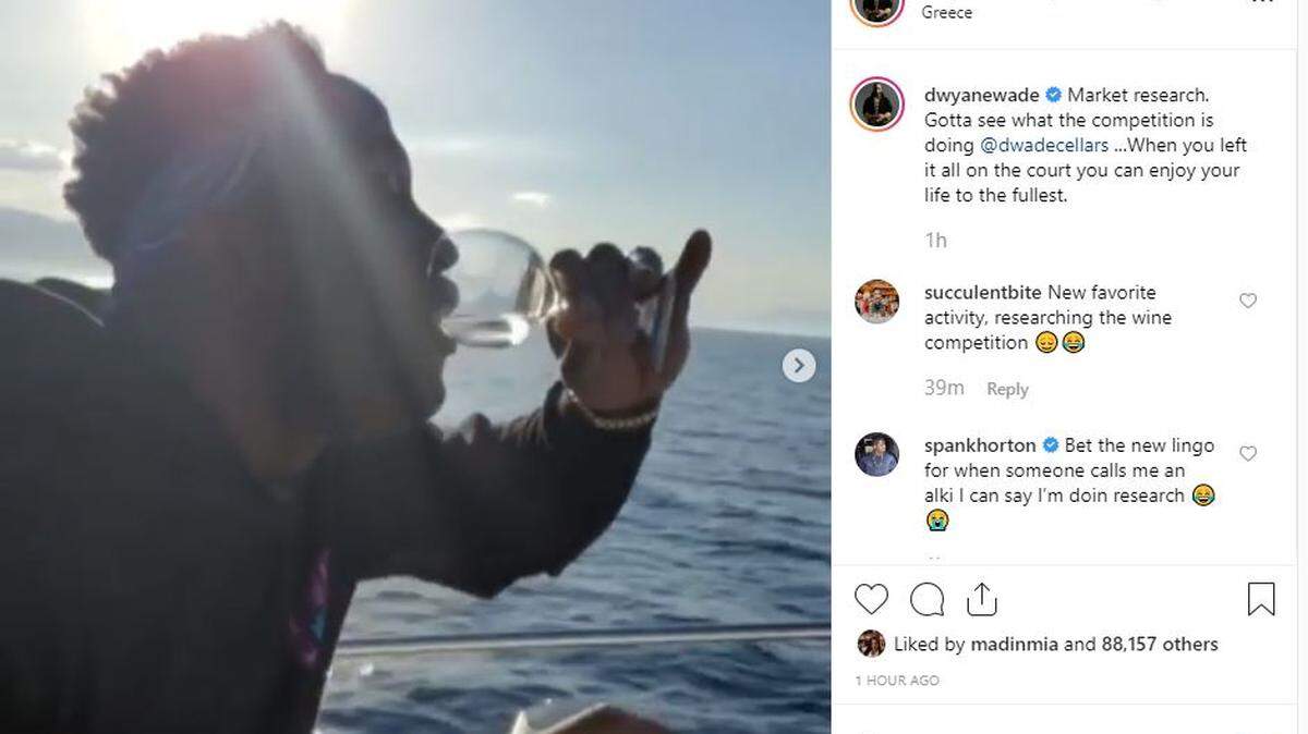 Dwyane Wade drinks wine on a yacht in Greece because he is living his best life.