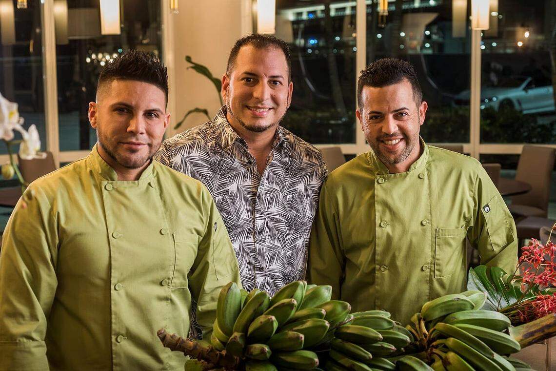 Chefs Emmanuel Jimenez and Luis Vazquez with owner Carlos Rodriguez (center).
